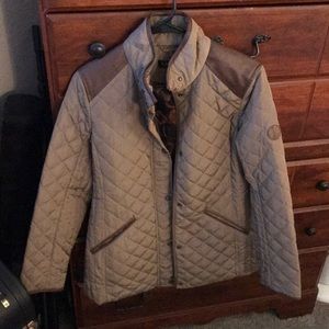 Bought new last year. Wore once. Not my style.